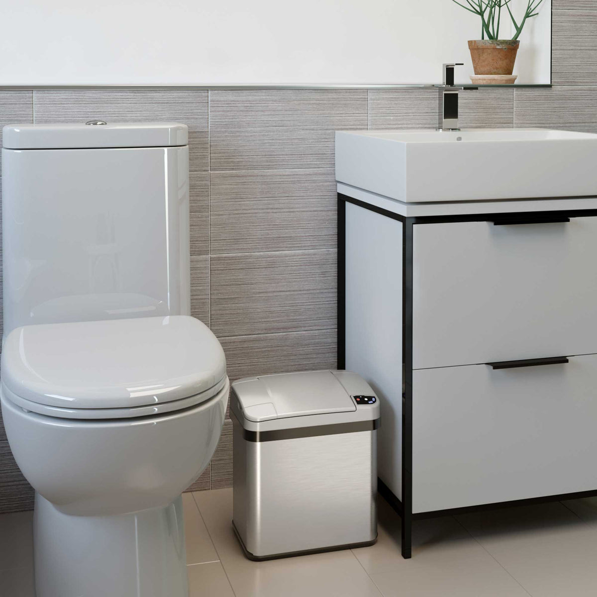 iTouchless 13 Gallon and 2.5 Gallon Kitchen and Bathroom Platinum Edition Sensor Trash Cans Combo Pack in bathroom