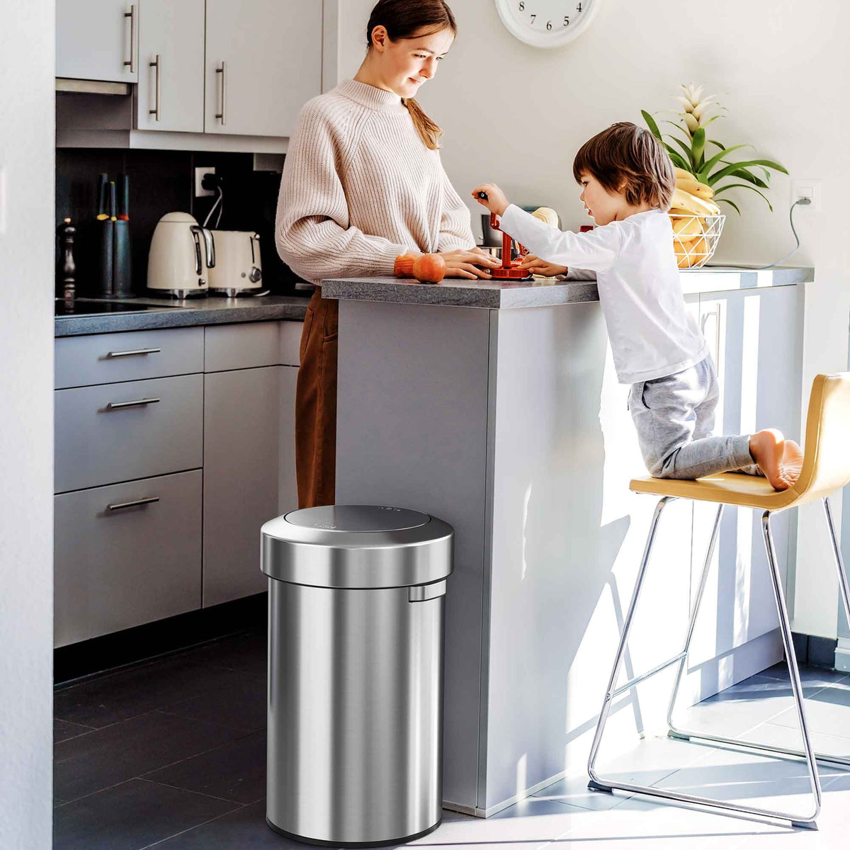 17 Gallon / 64 Liter Titan Swing Top Trash Can in kitchen