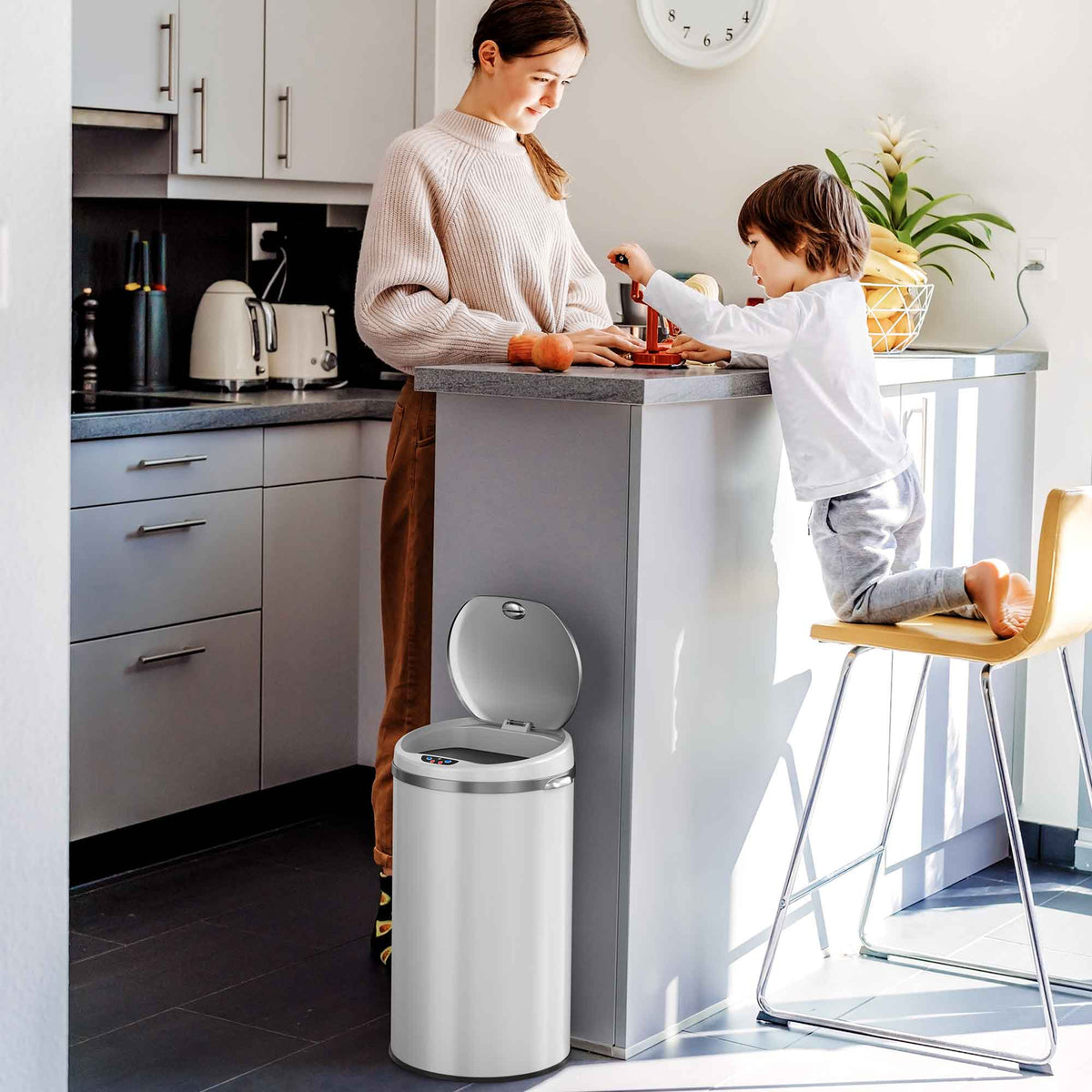iTouchless 8 Gallon White Stainless Steel Sensor Trash Can with Odor Filter in kitchen