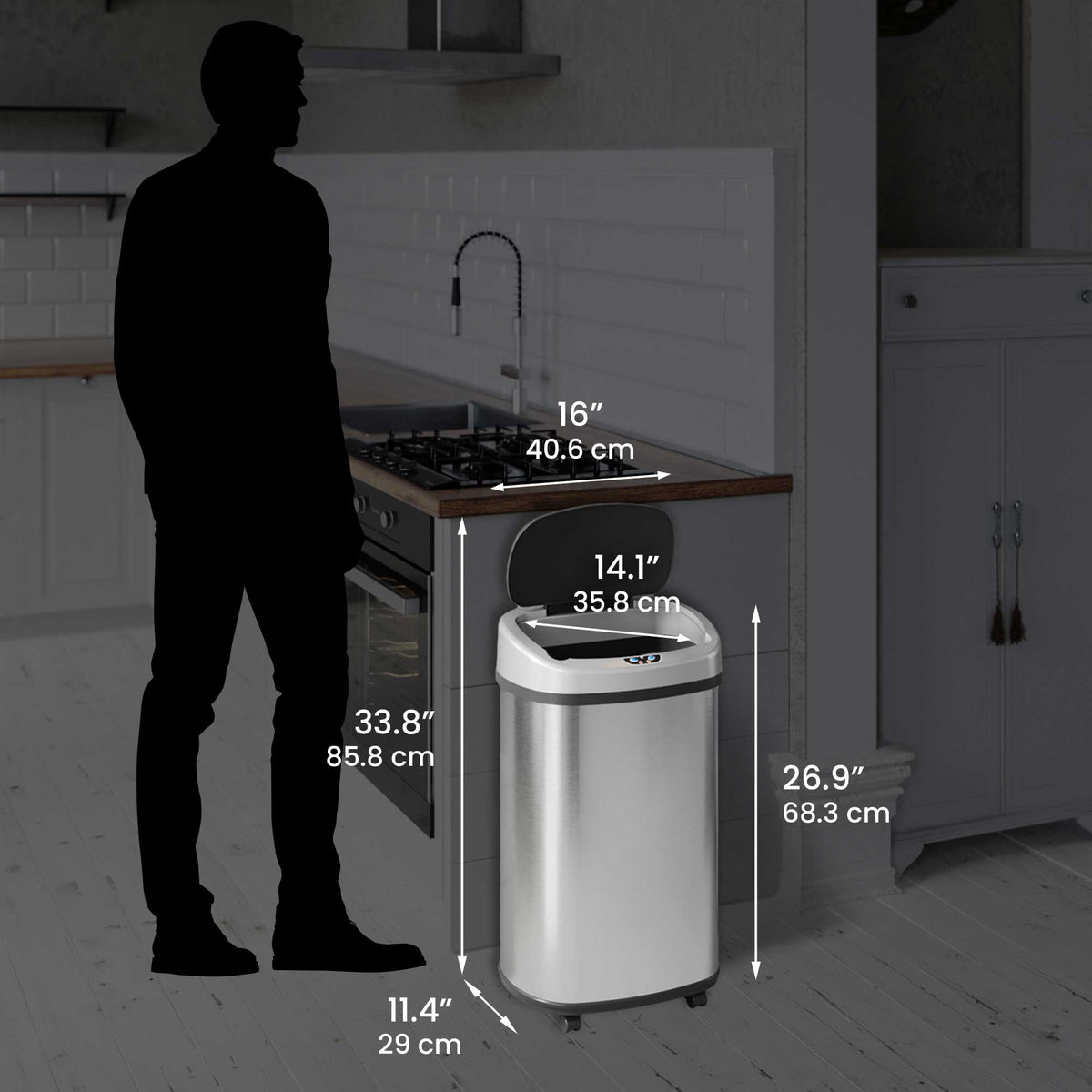 Size perspective image of the iTouchless ITOS13M trash can next to a silhouette of a person, displaying its full dimensions in inches and centimeters (33.8" height with lid open).